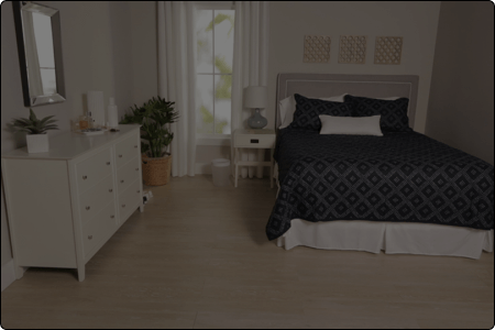 Picture of a bedroom of a client after having cleaned by Champagne Clean.