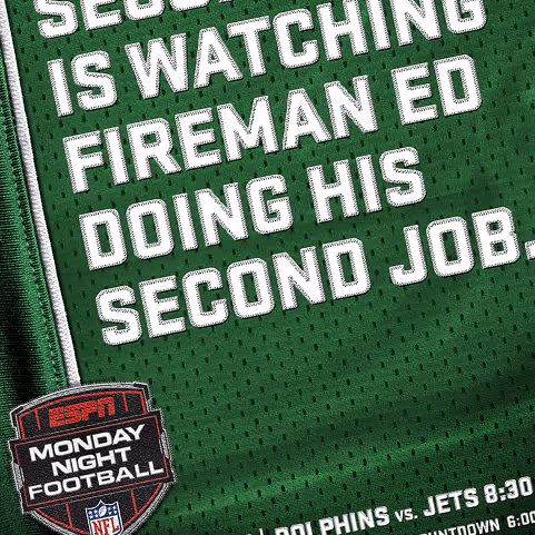 Green football jersey with white text reading 'Security is watching fireman Ed doing his second job.' plus ESPN Monday Night Football logo and NFL shield.