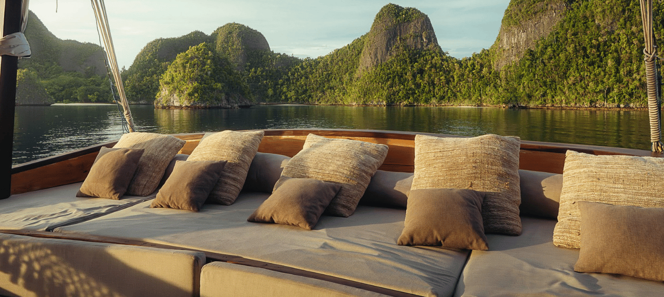 Lounge deck of the liveaboard facing Raja Ampat's karst islands