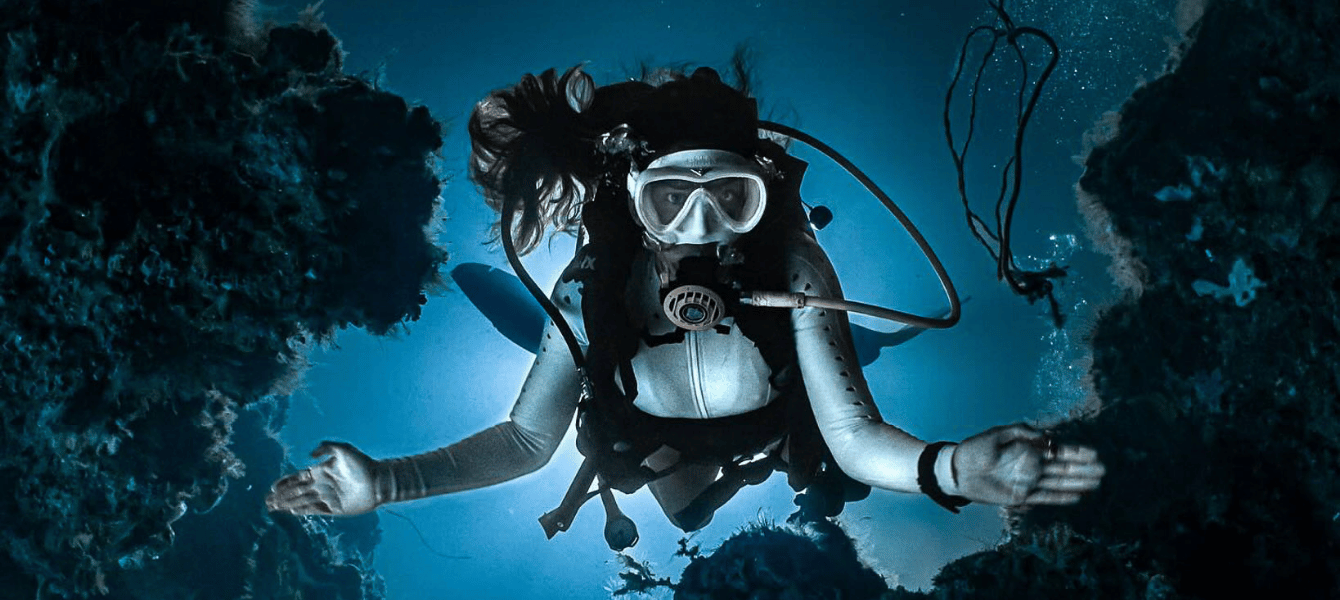 Scuba diver exploring a reef in Raja Ampat