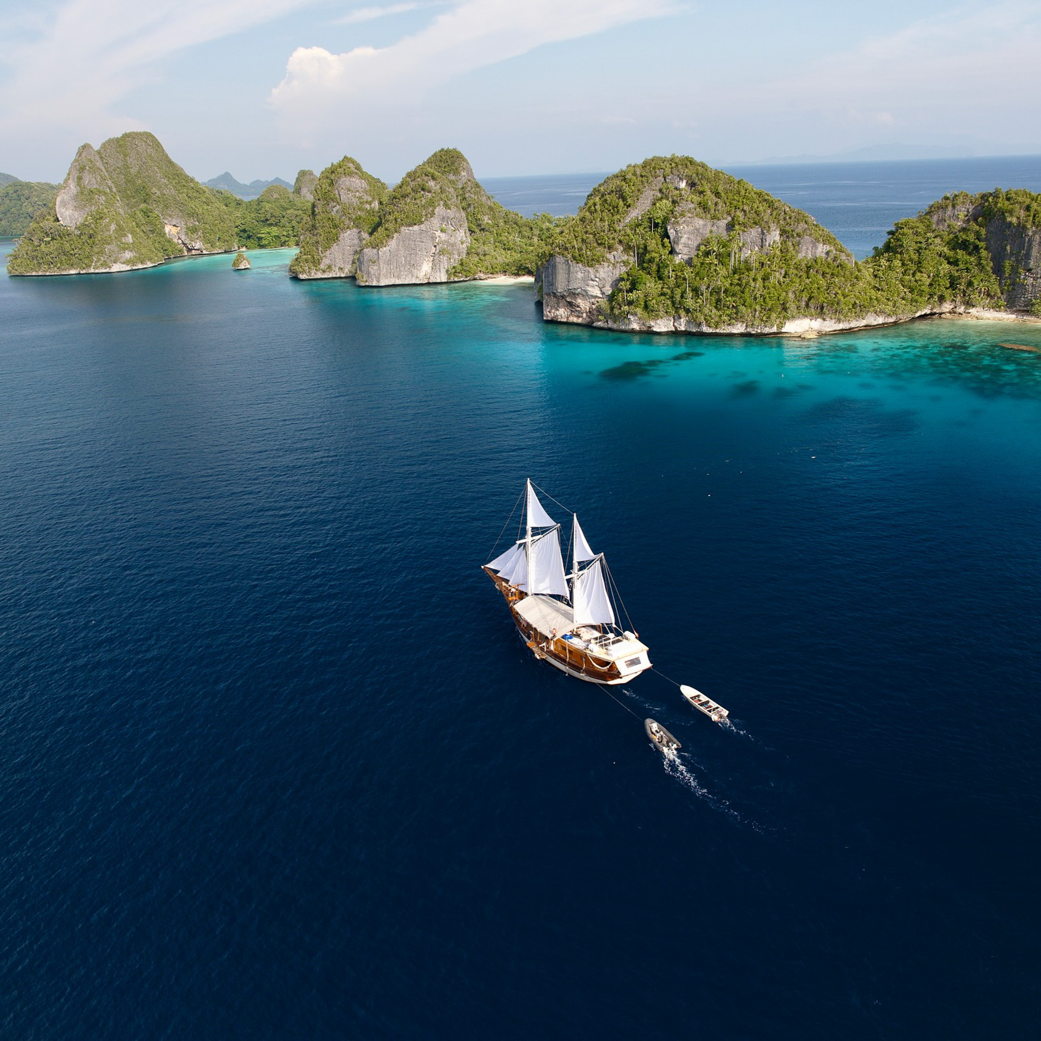 Traditional sailing boat among the islands of Raja Ampat