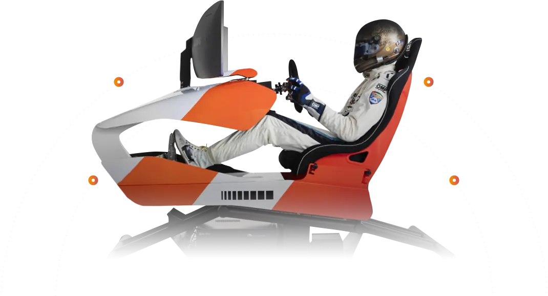 Person in racing suit and helmet sitting in an orange and white racing simulator setup with three monitors and steering controls.