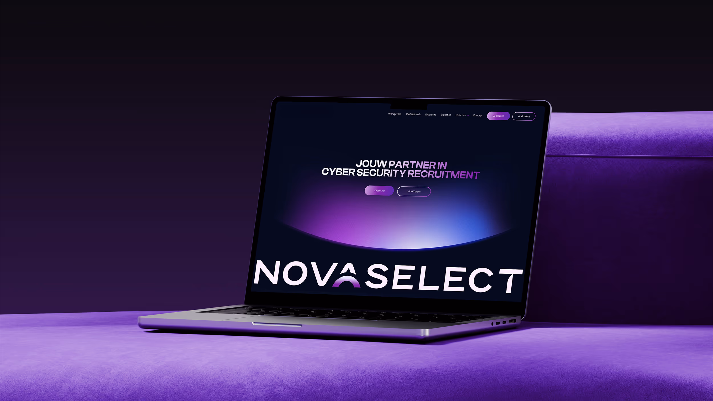 Open laptop on a purple surface displaying a website for Novaselect, a cyber security recruitment partner.