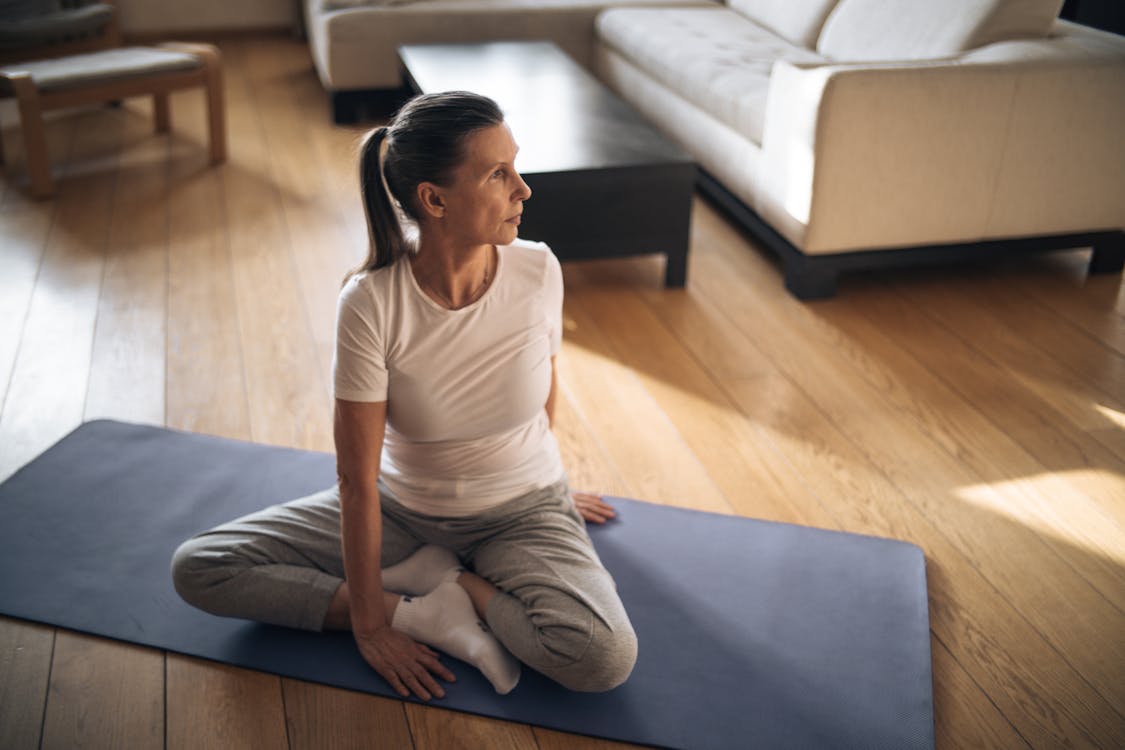 Free An Elderly Woman Doing a Yoga Stock Photo