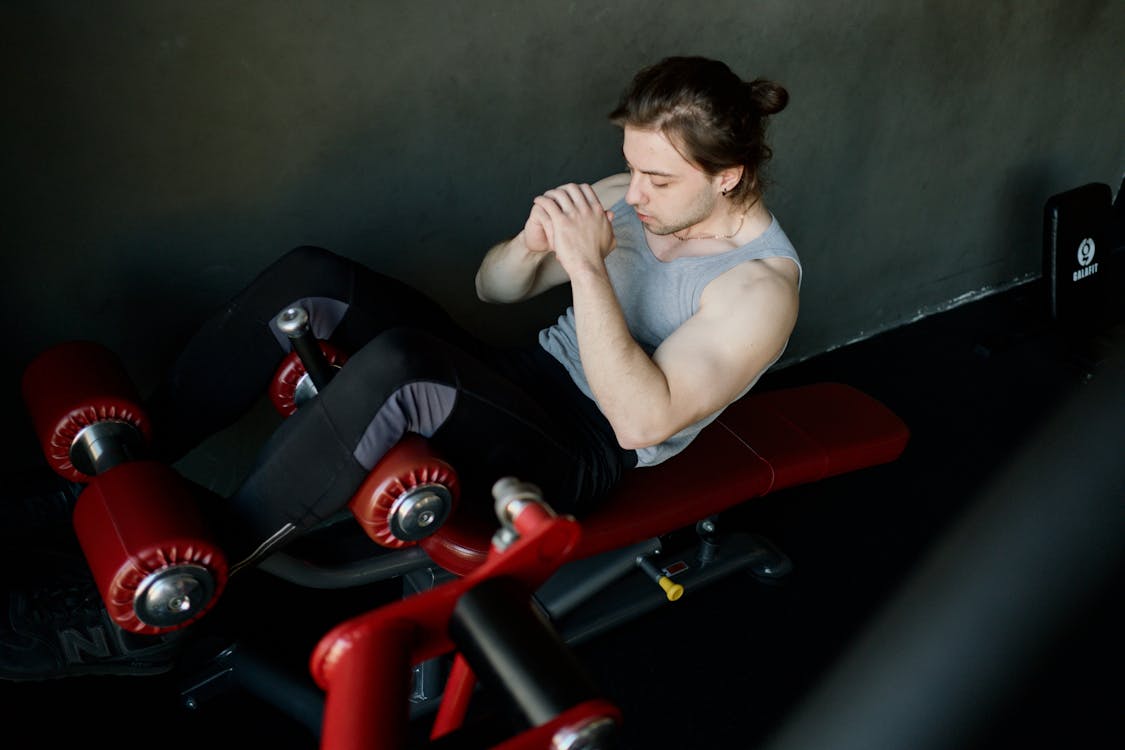 Free Man Exercising at a Gym Stock Photo