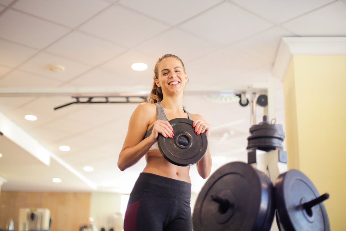 Free Photo Of Woman Holding Dumbell Stock Photo