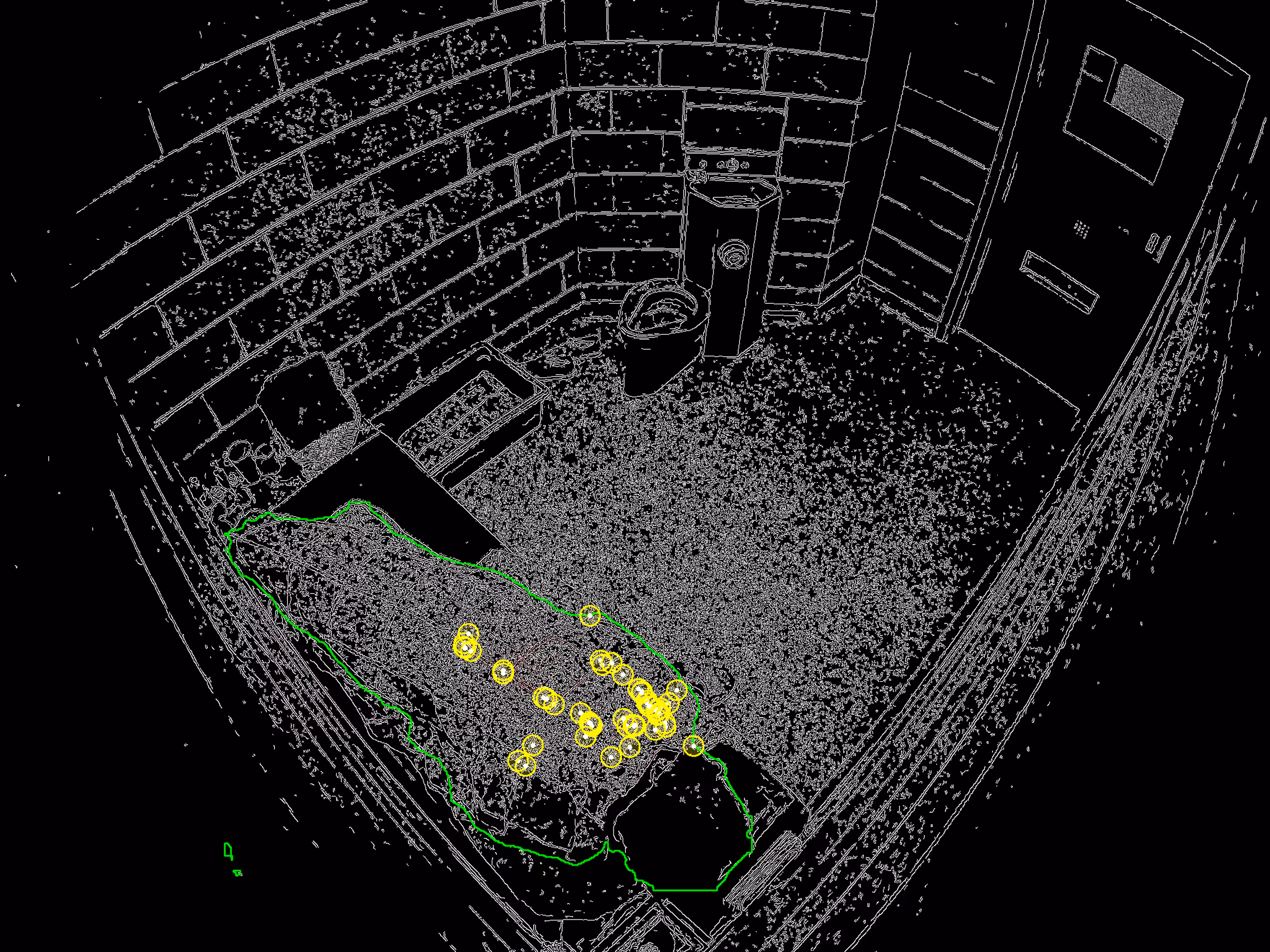 Outline of a person lying on a bed in a small room with yellow circles marking points on the body.