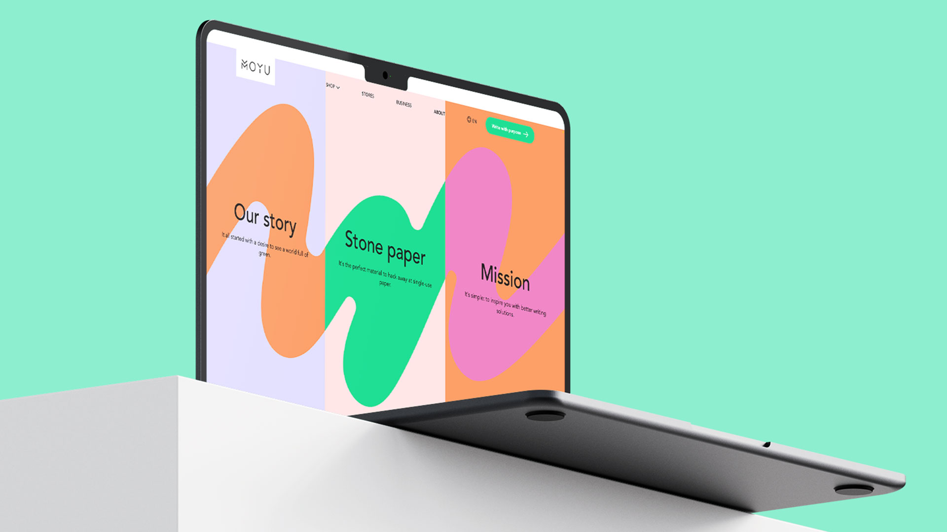 Een laptop met een kleurrijke websitepagina die drie secties toont: Our story, Stone paper en Mission.