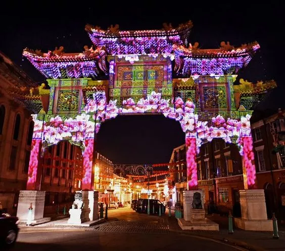 the chinese arch at night with lights on