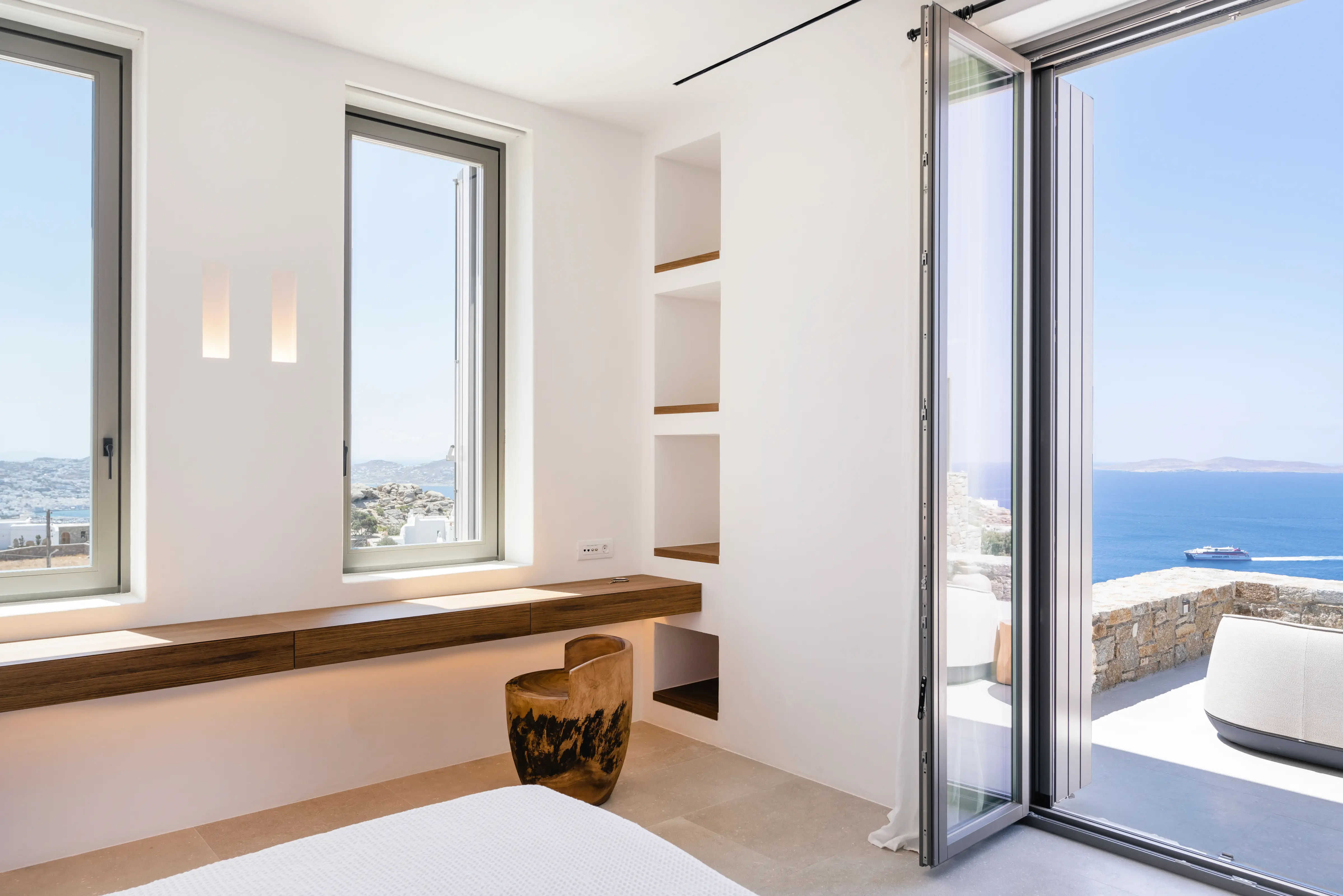 A bedroom with sea views.