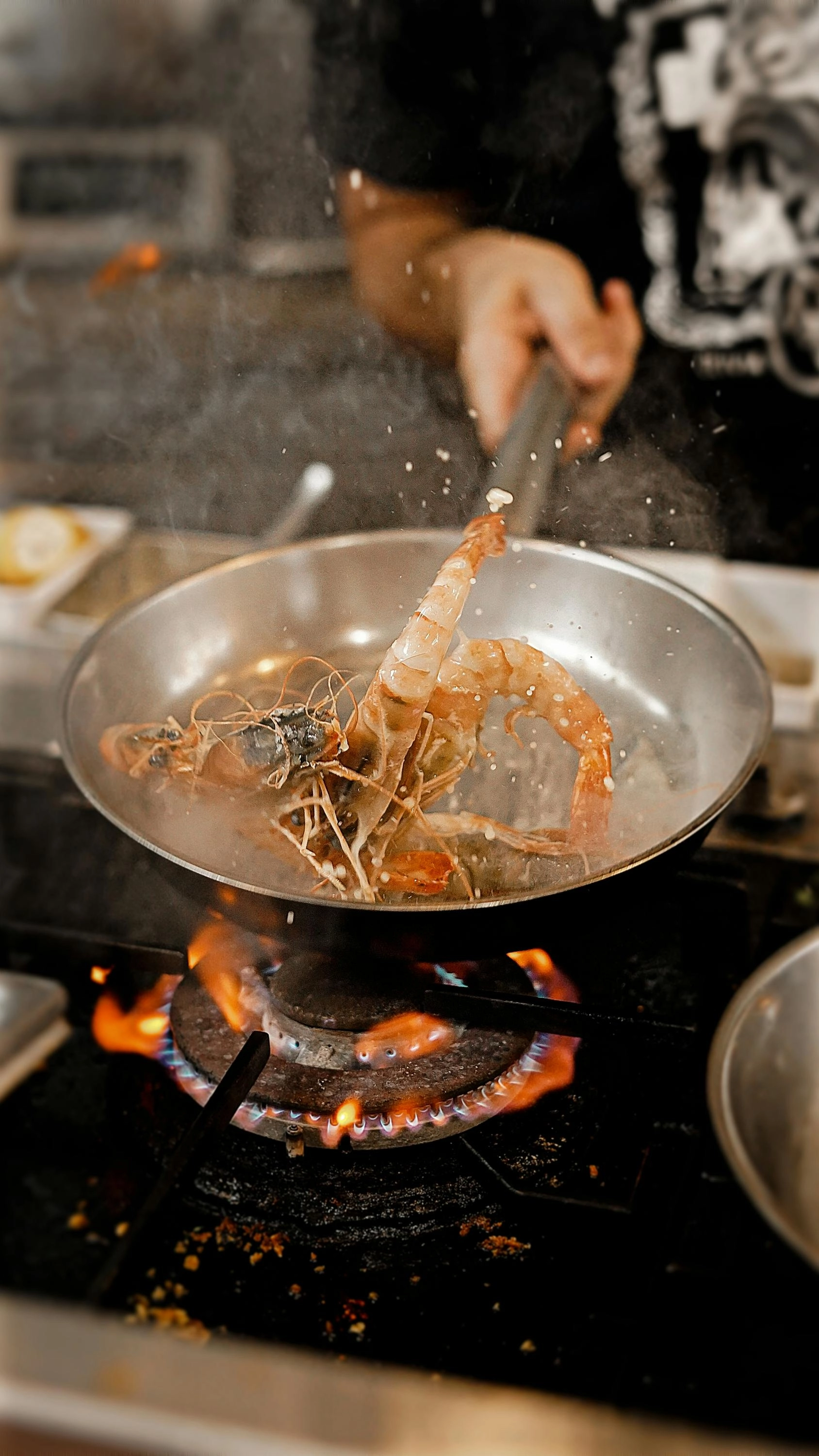 A shrimp being cooked.