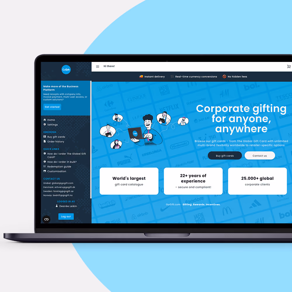 Laptop showing GoGift's Business Portal self-service homepage with the heading 'Corporate gifting for anyone, anywhere'
