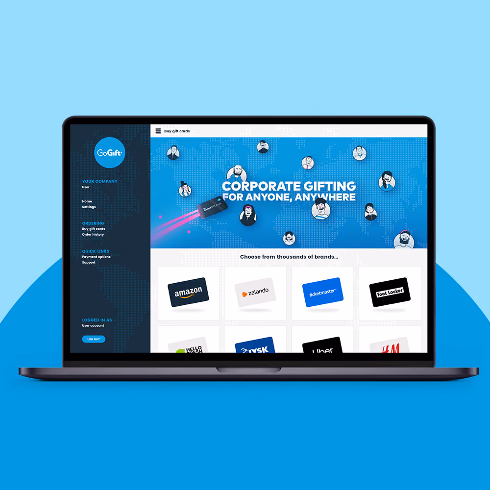 Laptop showing GoGift's Business Portal homepage with the heading 'Corporate gifting for anyone, anywhere'