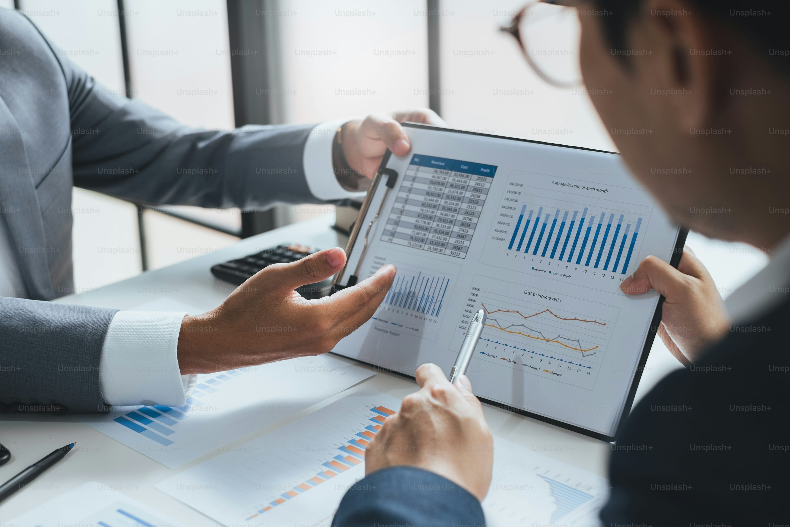Businessman meeting and working with financial report, talking about business plan for investment, finance analysis concept