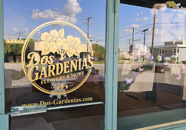 Delicate white floral arrangement with greenery