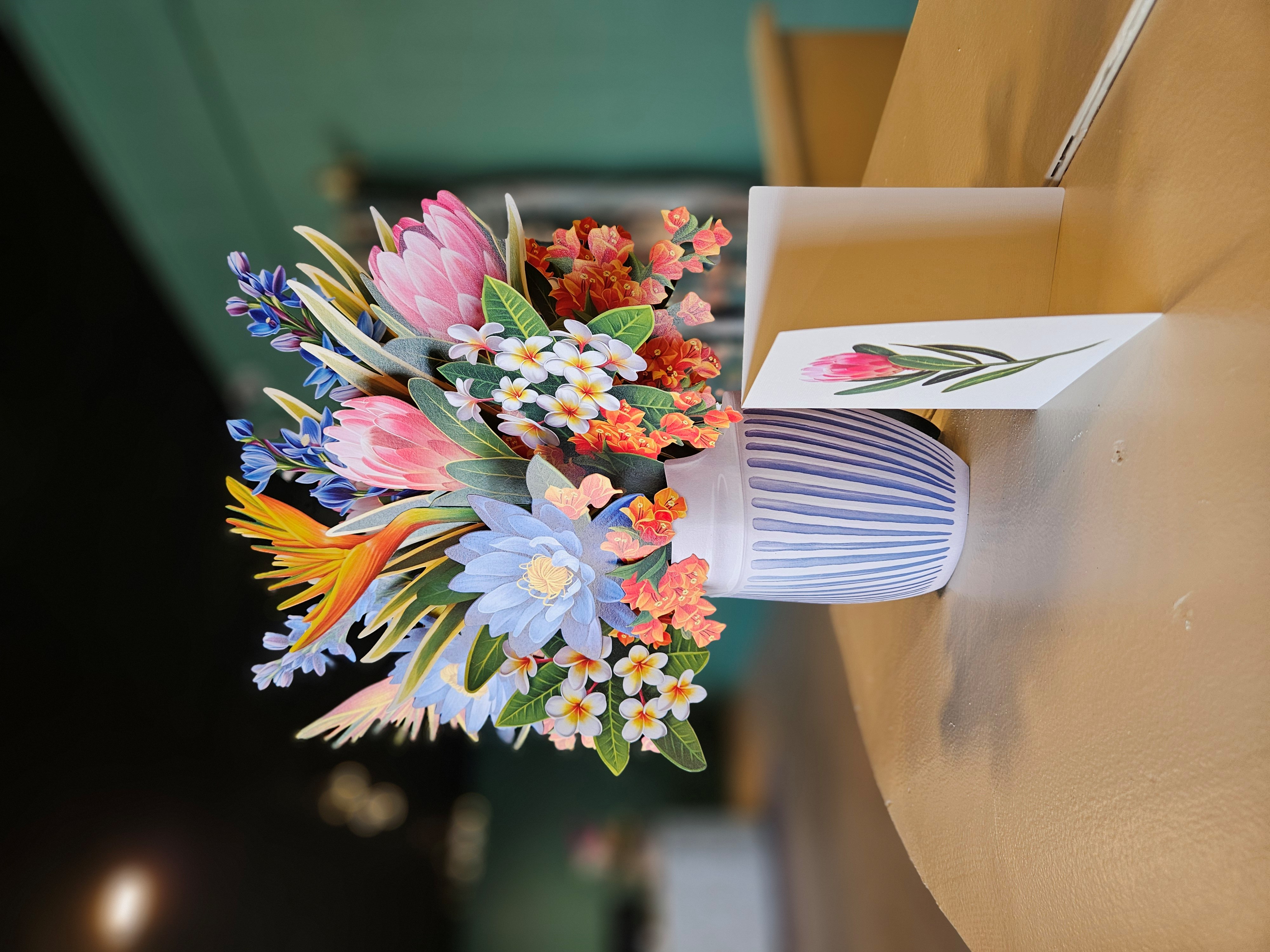 Elegant white lilies arranged in decorative vase
