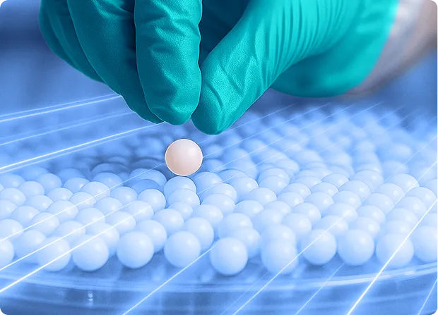 Technician testing a component on a quality inspection station with monitoring equipment.