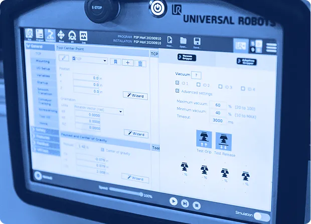 Touchscreen control interface displaying robotic system settings and vacuum gripper parameters.    