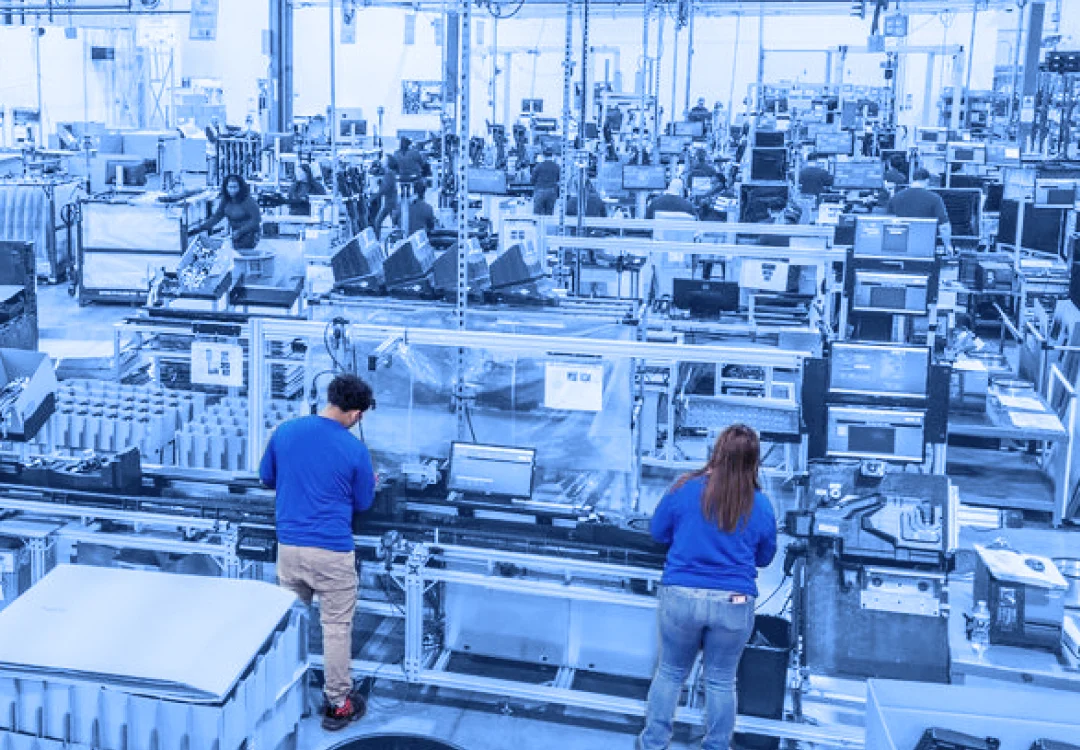 Phoenix Assembly workers packing products from multiple work stations