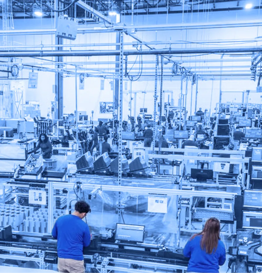 Phoenix Assembly workers packing products from multiple work stations