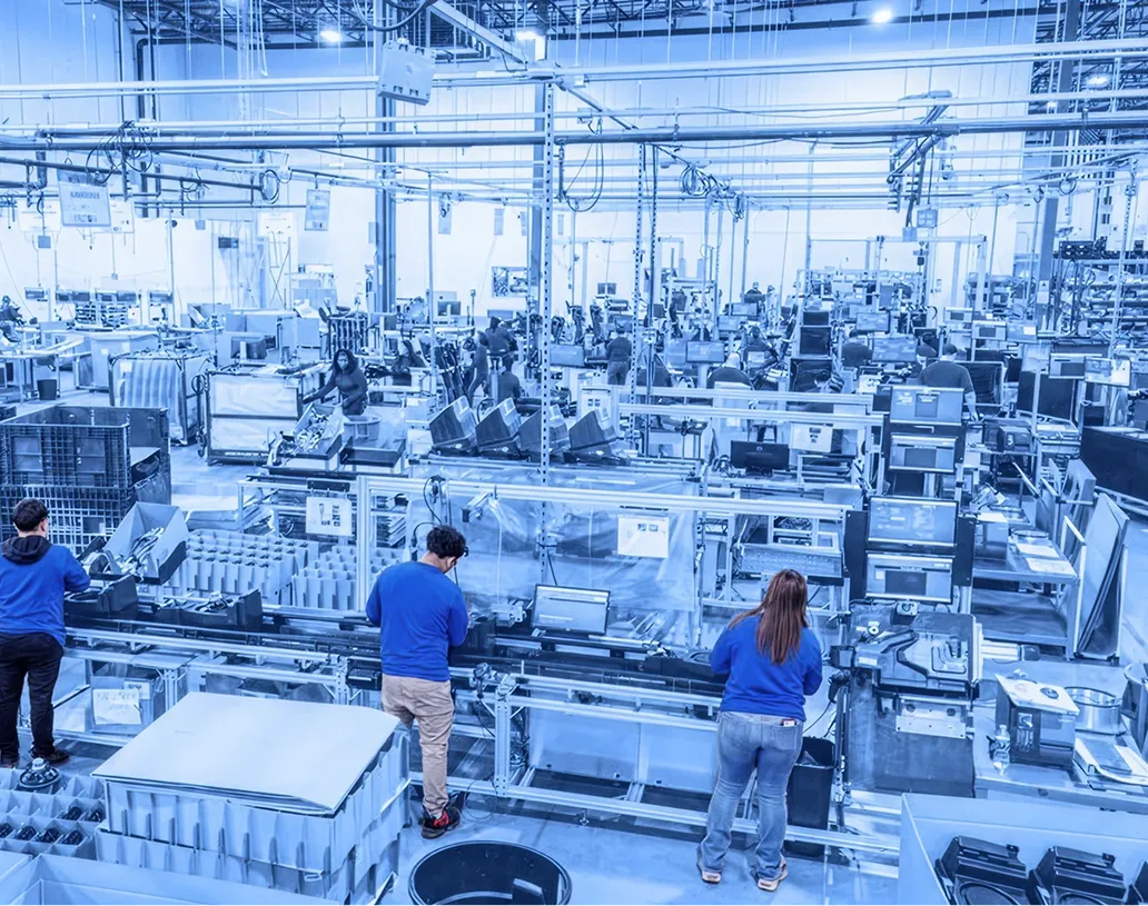 Phoenix Assembly workers packing products from multiple work stations