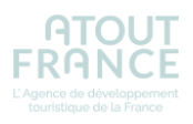 Logo d'Atout France avec le texte « L'Agence de développement touristique de la France » en dessous.