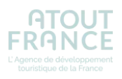 Logo d'Atout France avec le texte « L'Agence de développement touristique de la France » en dessous.