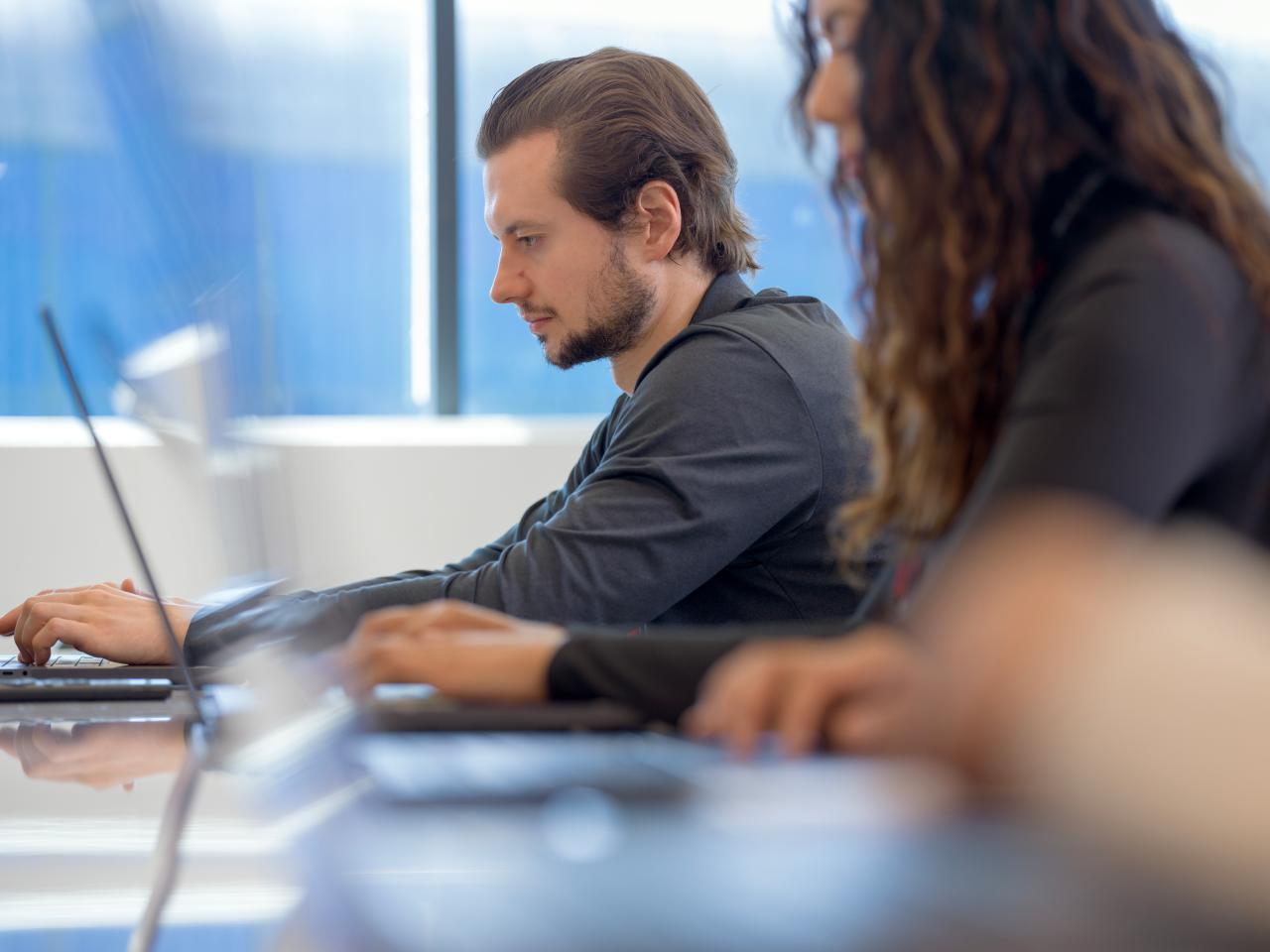 PhD Student on Laptop