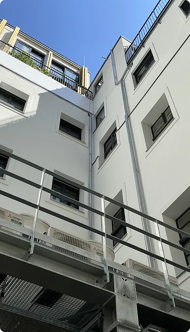 Gebäudefassade als Referenzprojekt der technischen Gebäudeplanung
