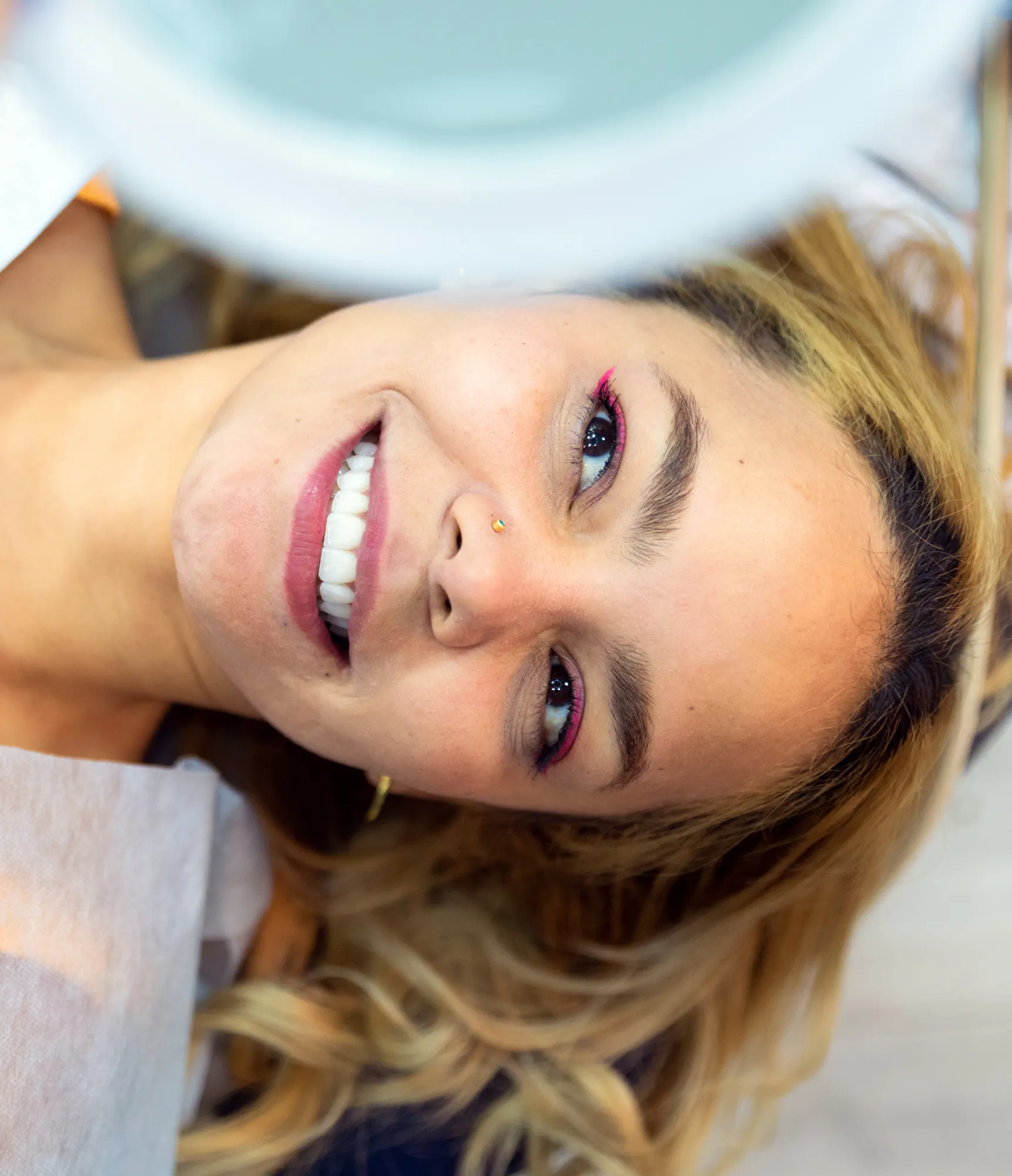 An organized office space features a desk with a computer, chair, and office supplies.