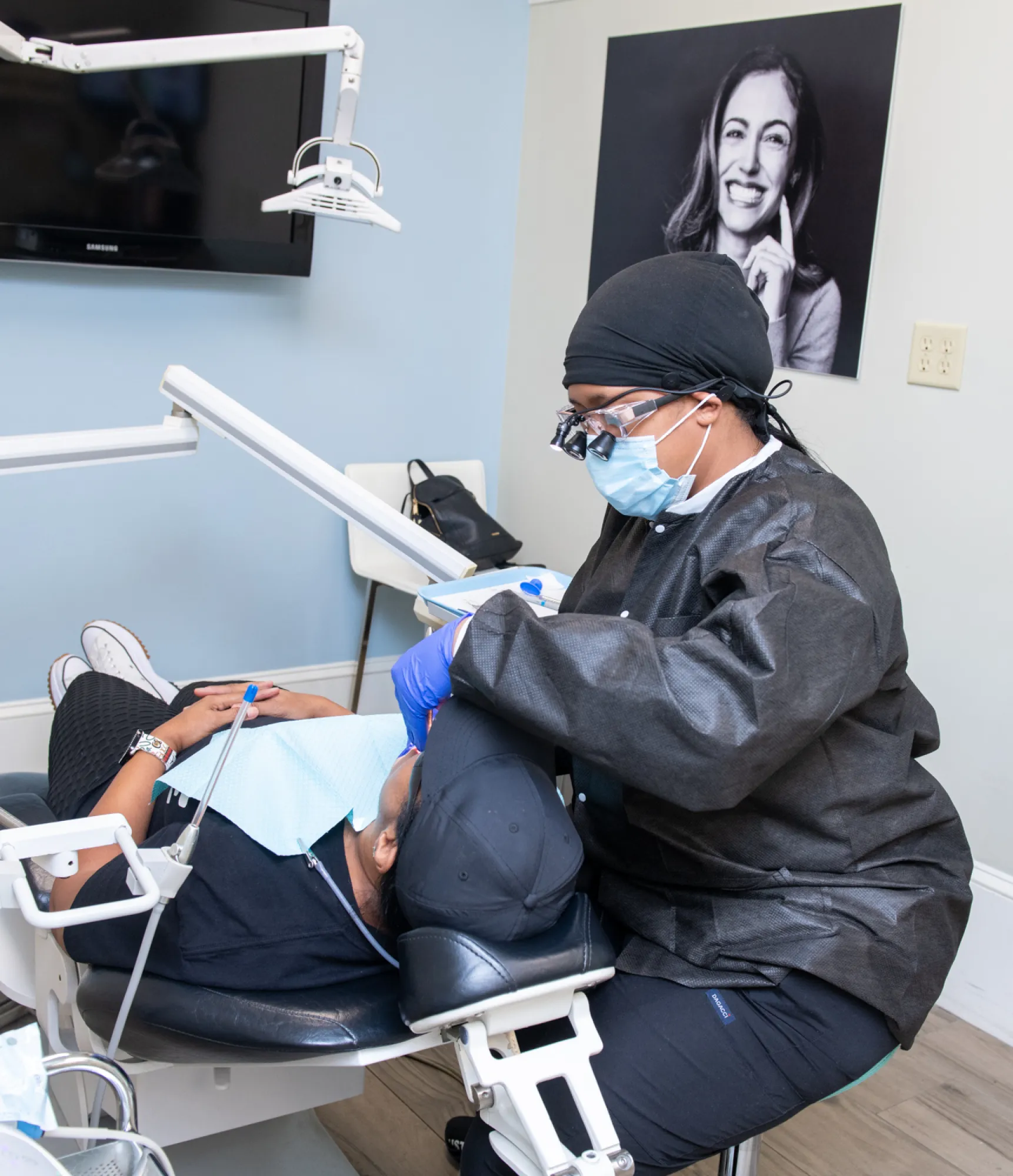 Small children's table with colorful chairs and toys in a bright, modern room.