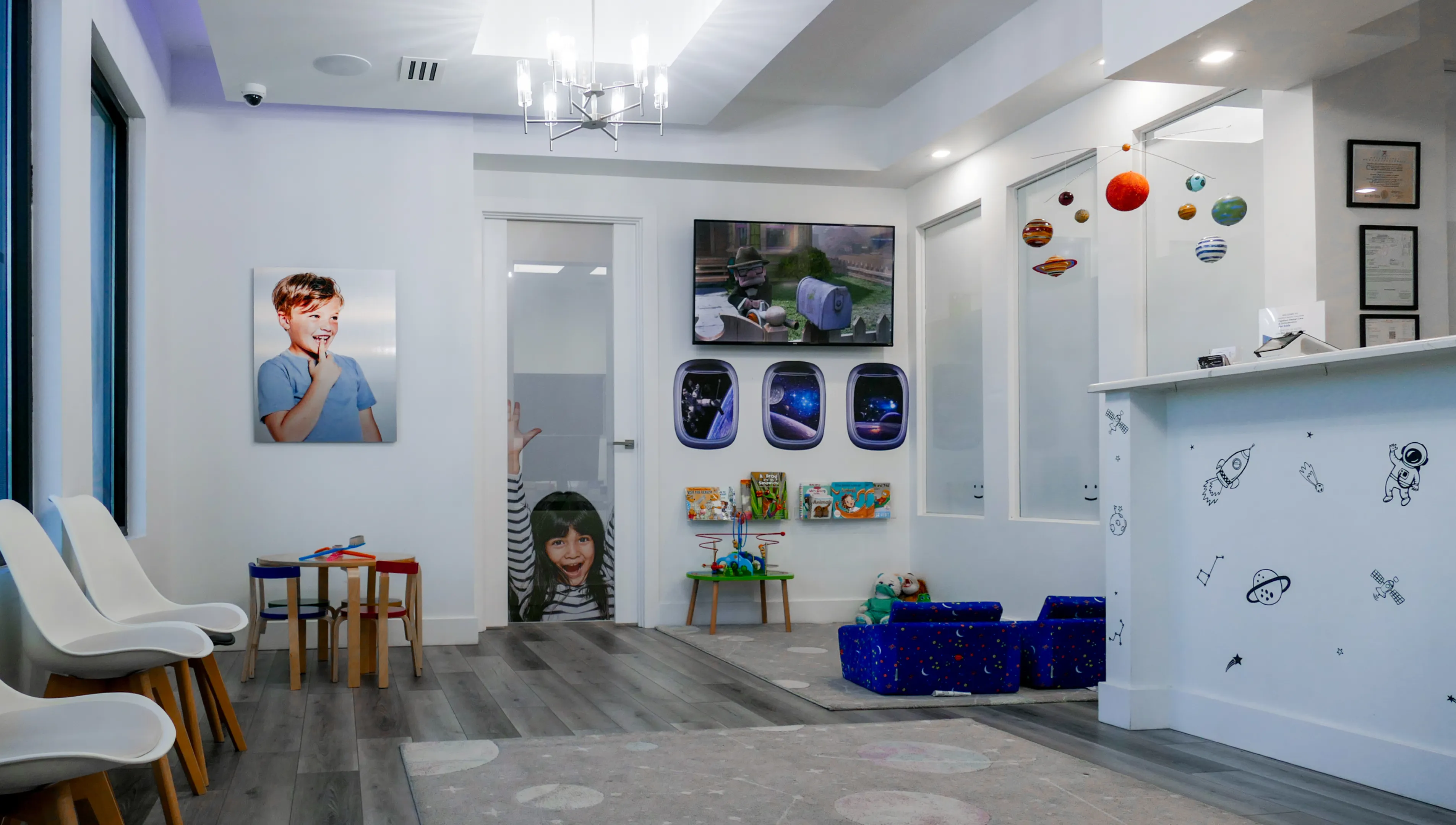 Empty dental chair in a modern, bright clinic with equipment and tools around.