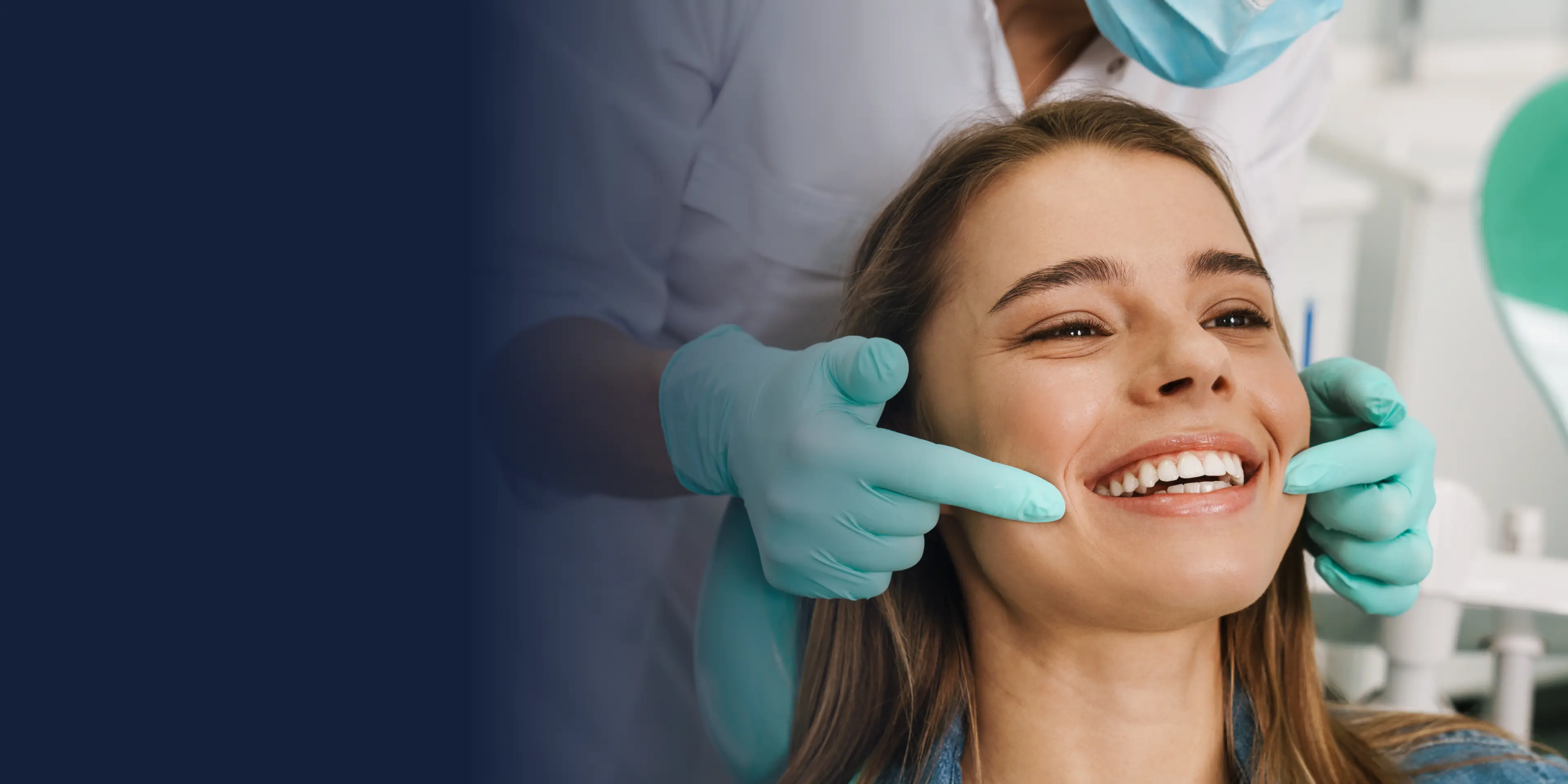 A dentist in gloves examines a smiling woman's teeth, checking her dental health.