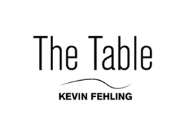 Das The Table-Logo mit dem Namen Kevin Fehling darunter.