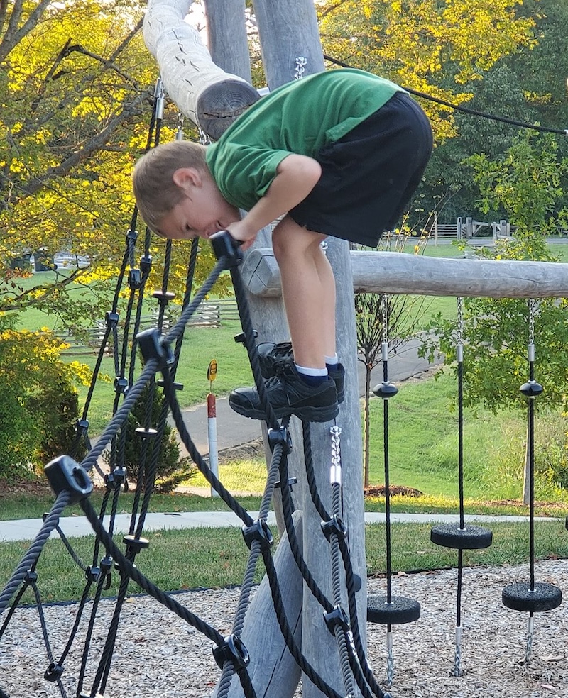 Kid playing on a playground
