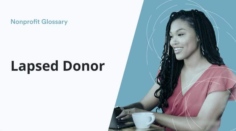 Smiling woman in pink blouse using laptop with coffee cup, text 'Nonprofit Glossary Lapsed Donor' on left.