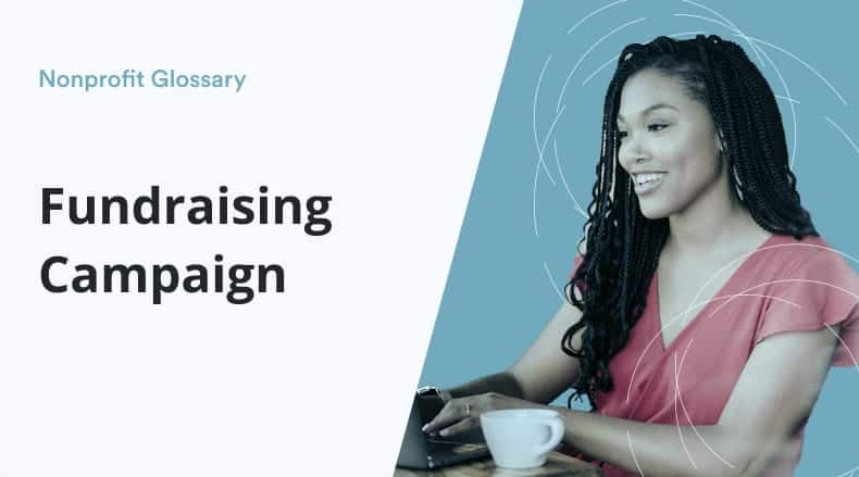 Smiling woman with braided hair typing on laptop beside a white coffee cup with text 'Fundraising Campaign'.