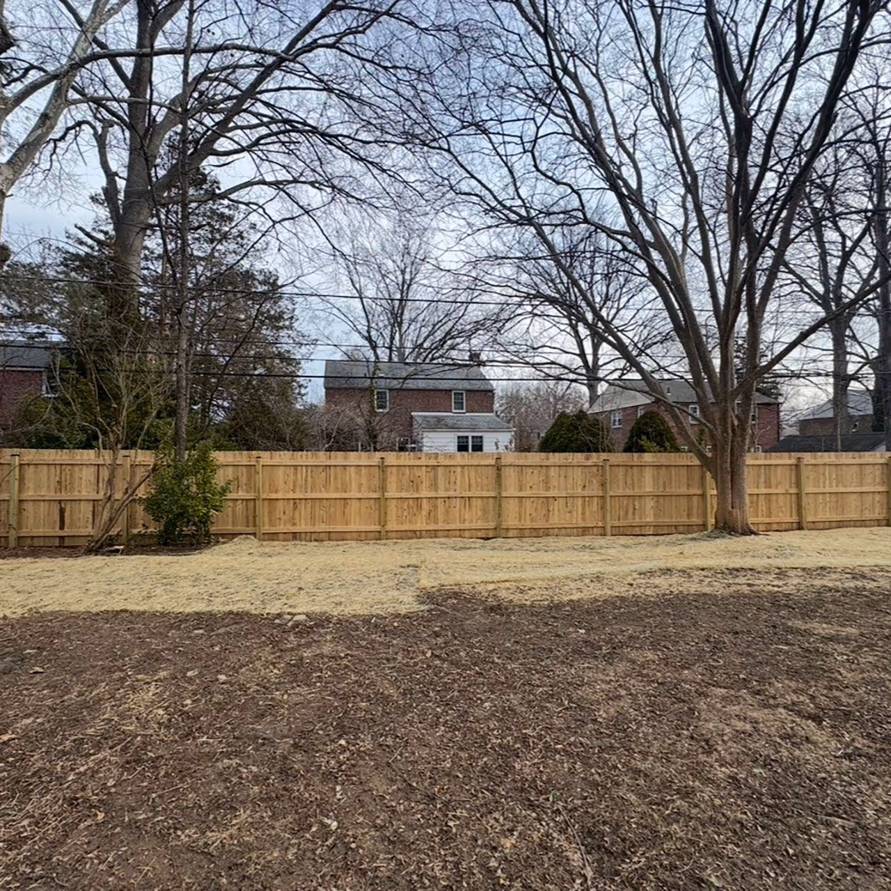 Installed privacy fencing for residential property boundary