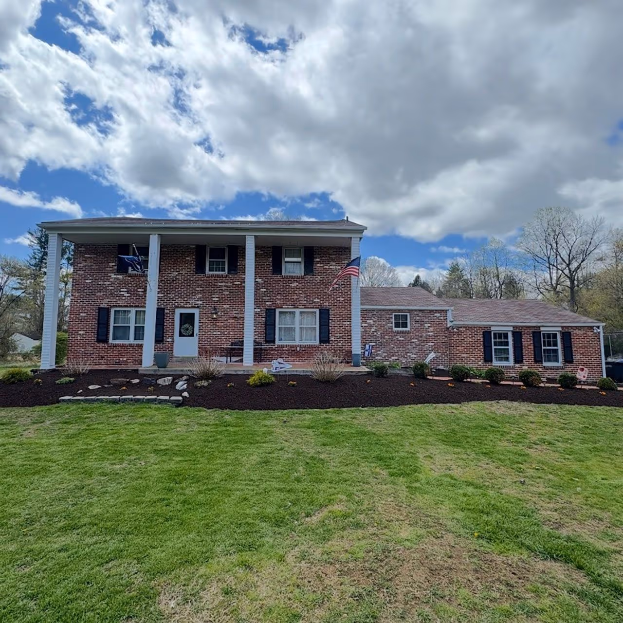 Thick green grass maintained by Santivasci Landscaping