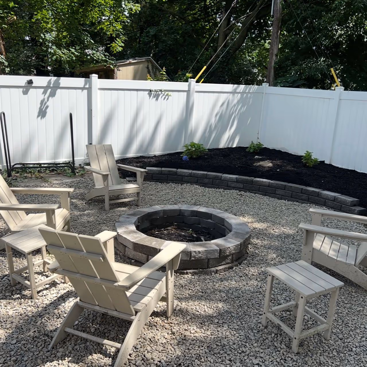 Outdoor living space hardscape for relaxation and entertainment