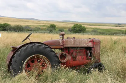 tractor sitting in the field