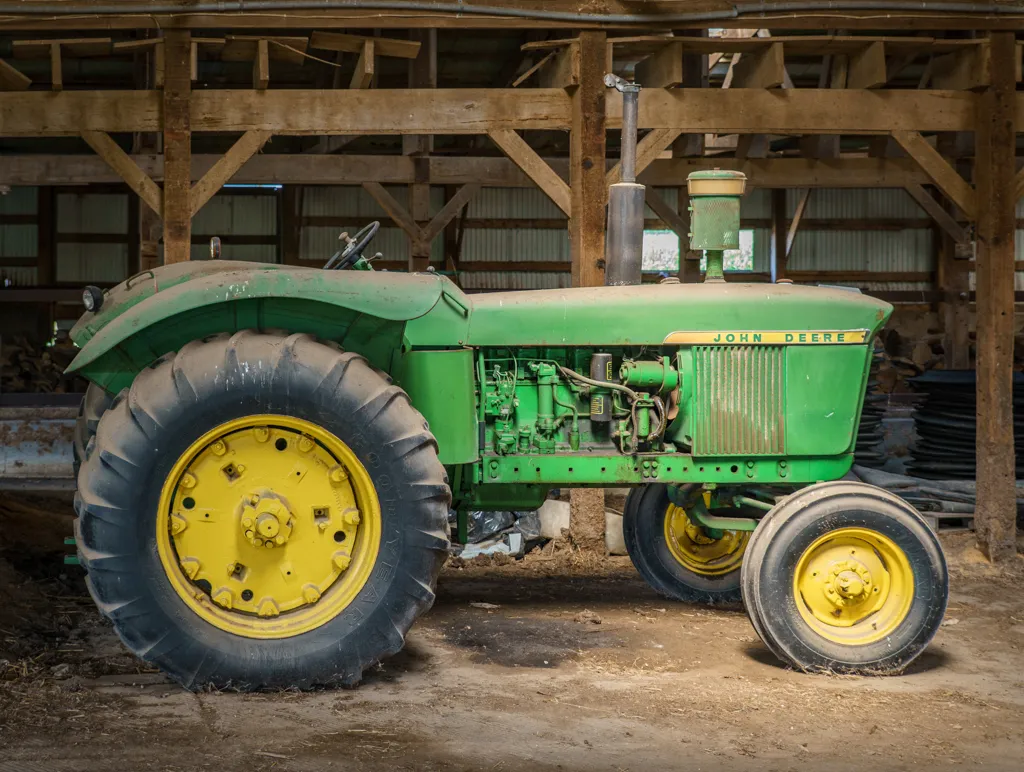 John Deere 4020 in a shed