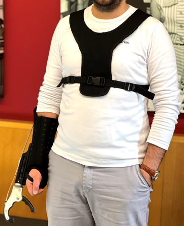Photo of man wearing a harness prototype created by WearLab Solutions.