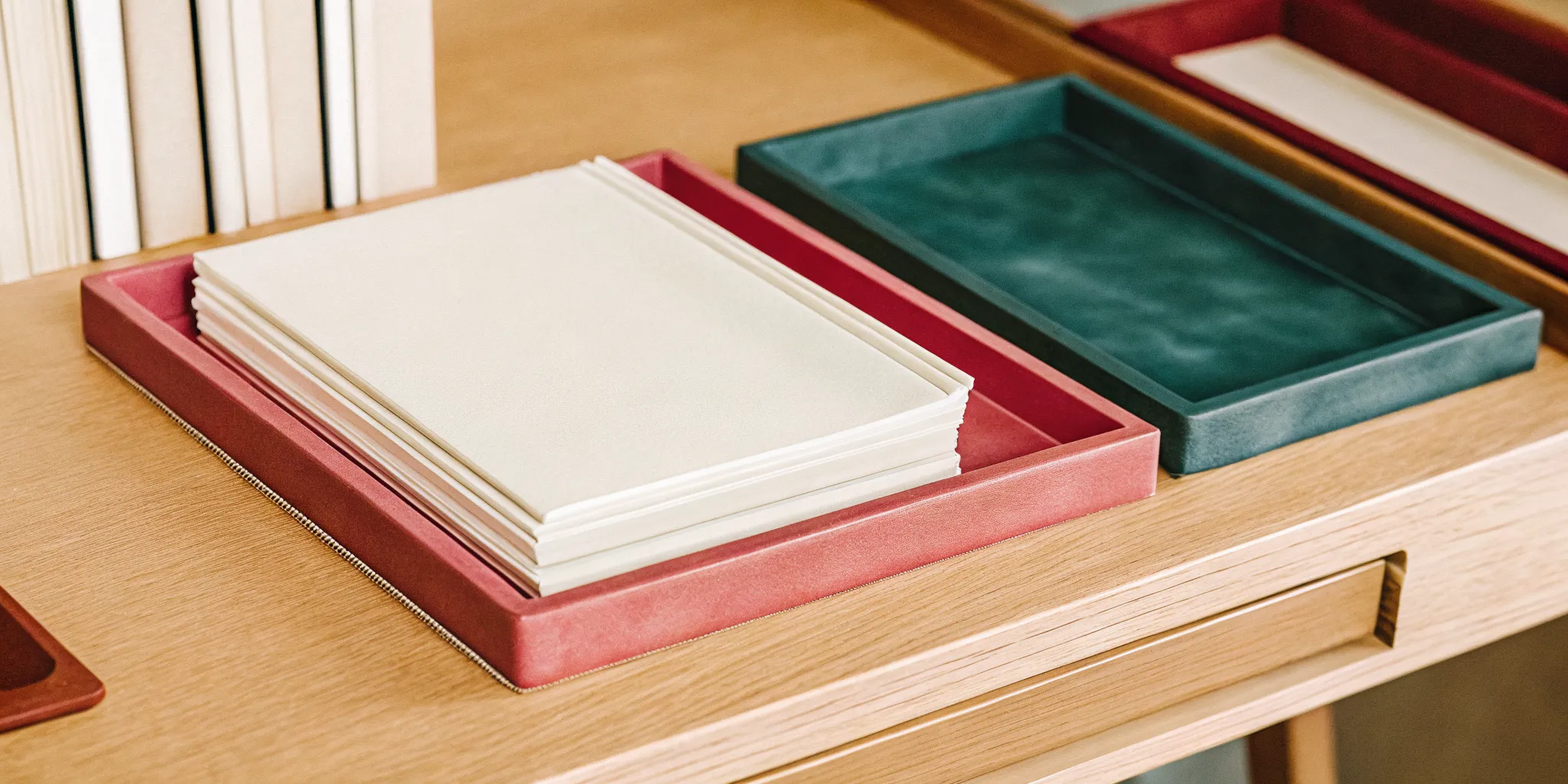 A tray of papers showing how to delegate tasks and overcome delegation as a weakness.