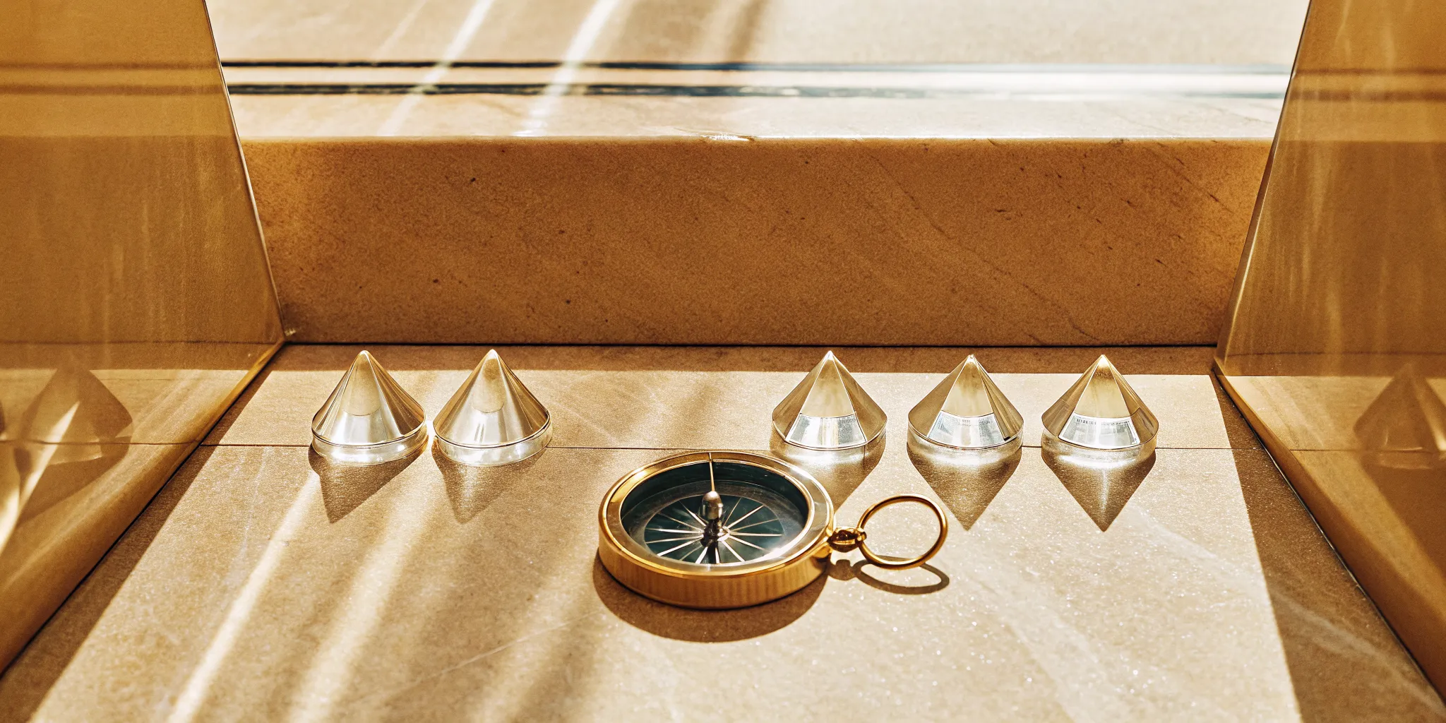 A compass guides the five essential qualities of a good leader.