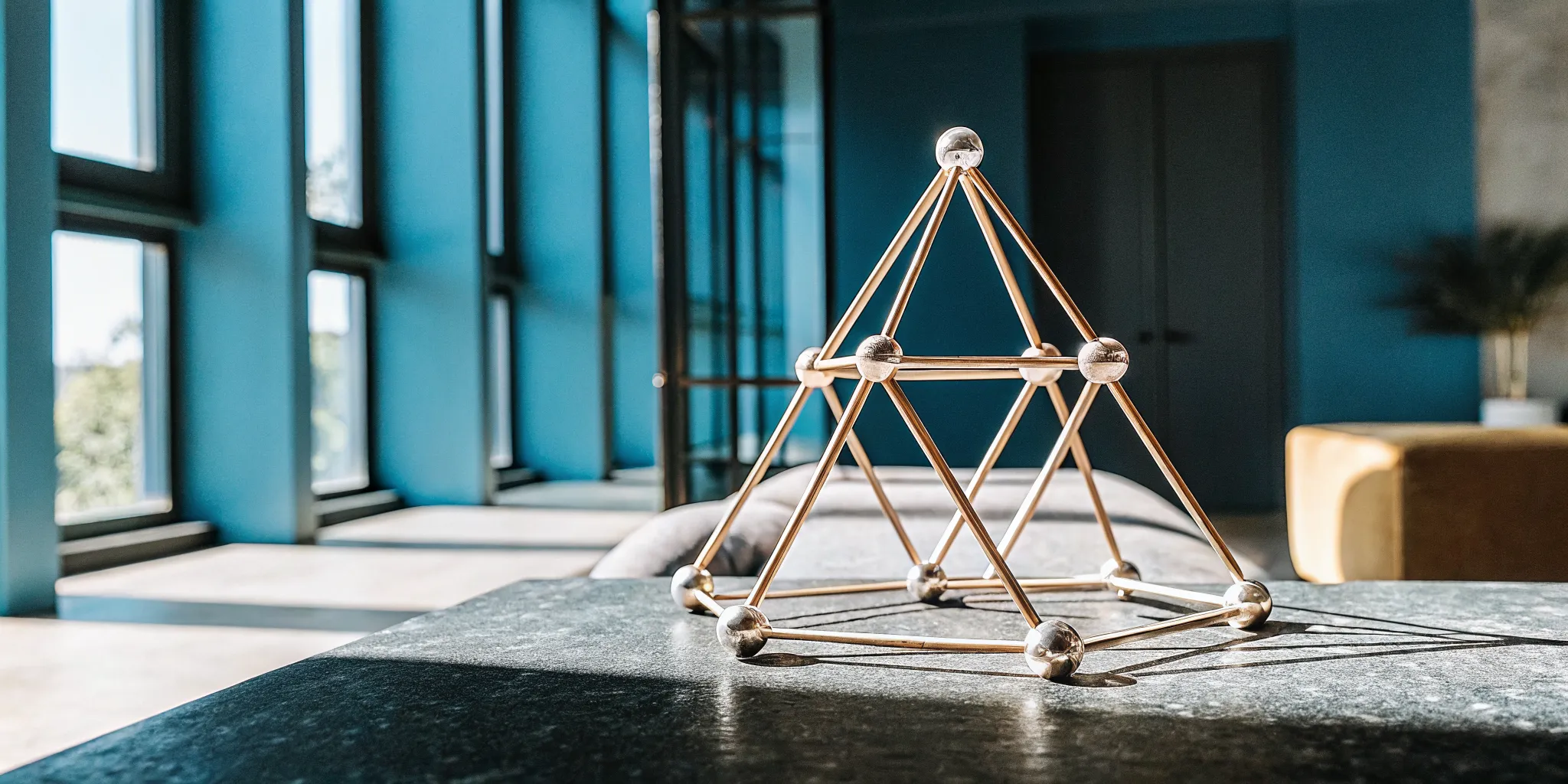 A pyramid structure representing growth and connection in leadership learning communities.