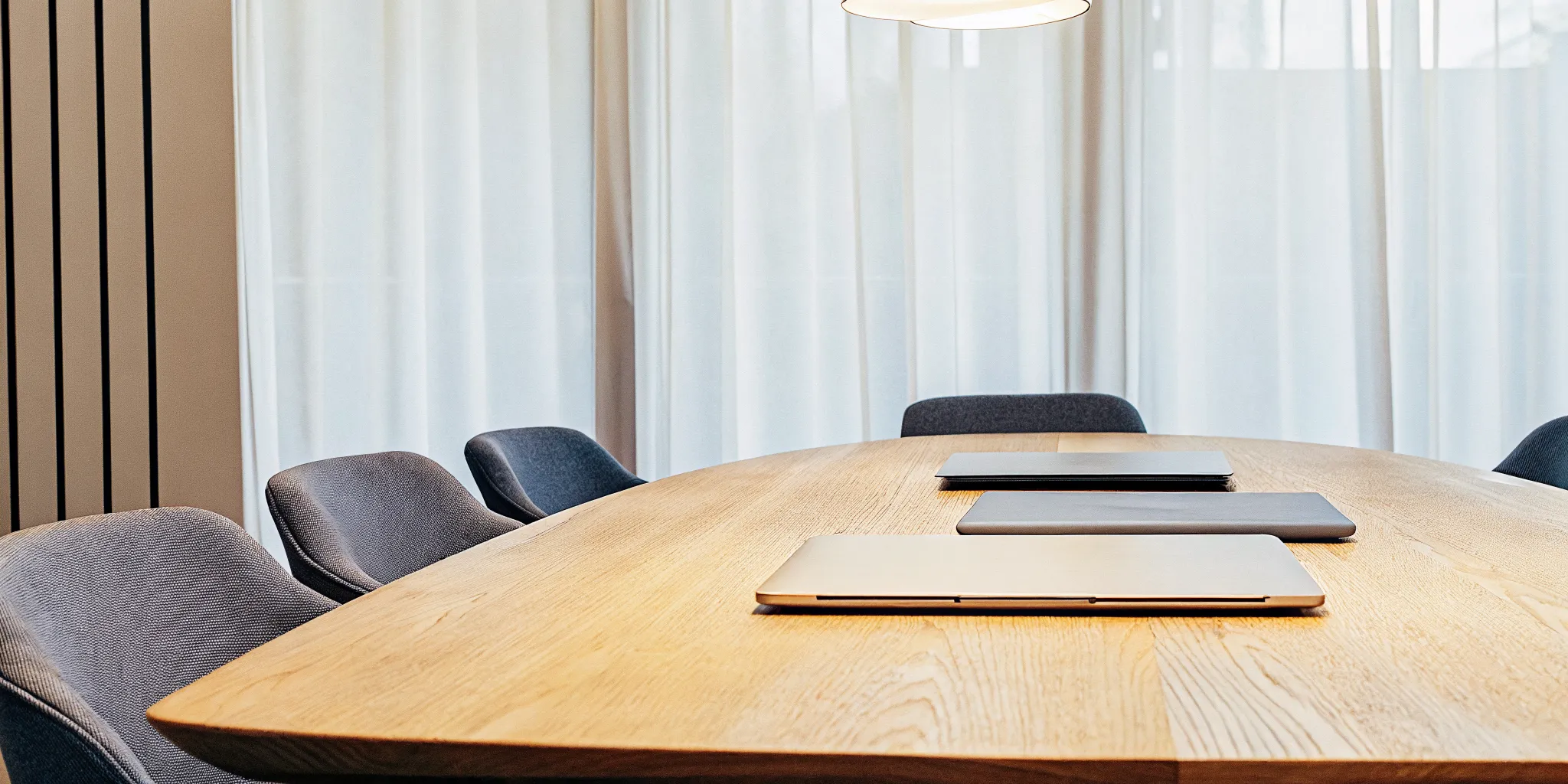 A modern conference room for discussing the nature of staff communication.