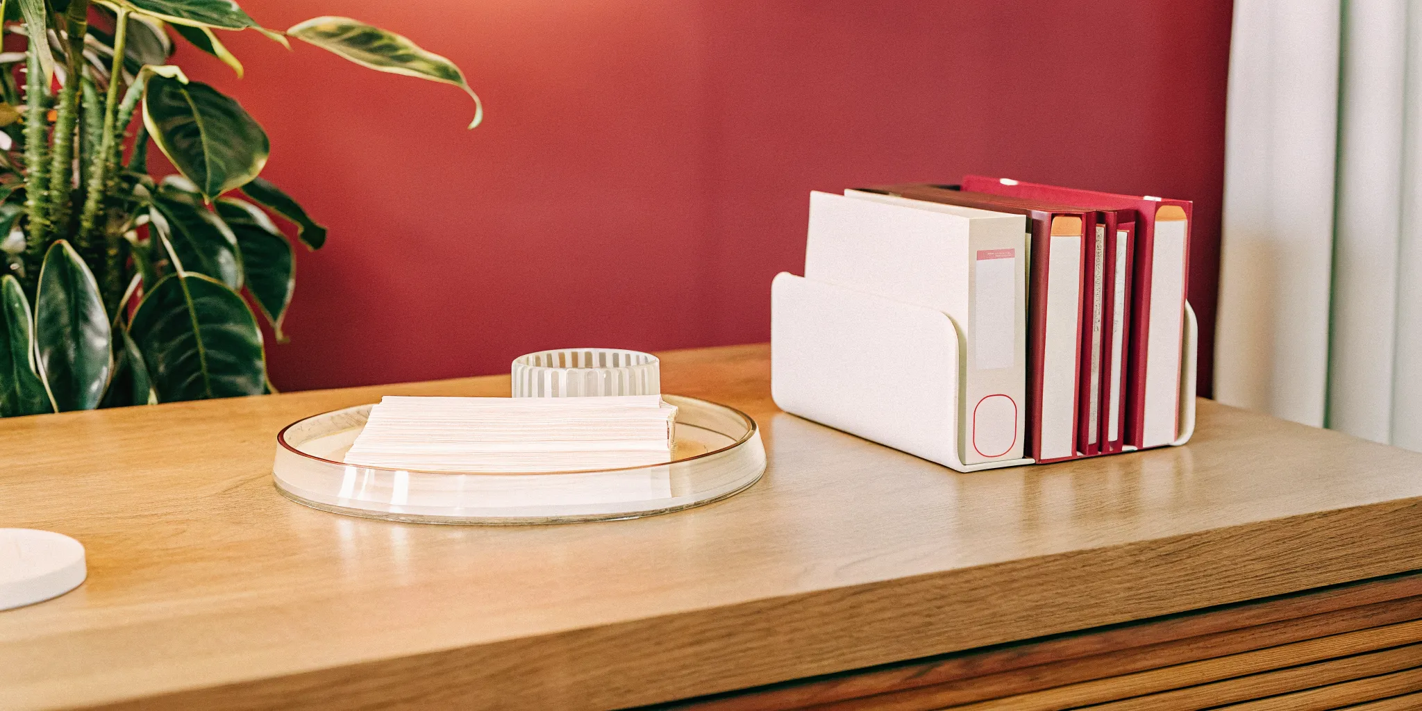 Files and folders on a desk organized for delegating tasks effectively.