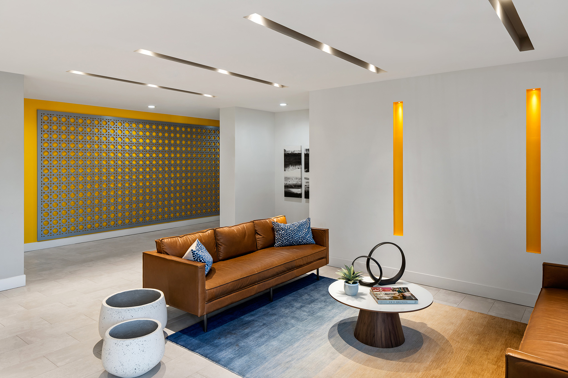 Community room with chairs, tables, and tv