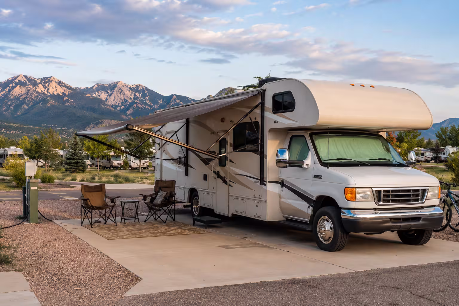 Class C RV rental pickup in Denver with Front Range foothills